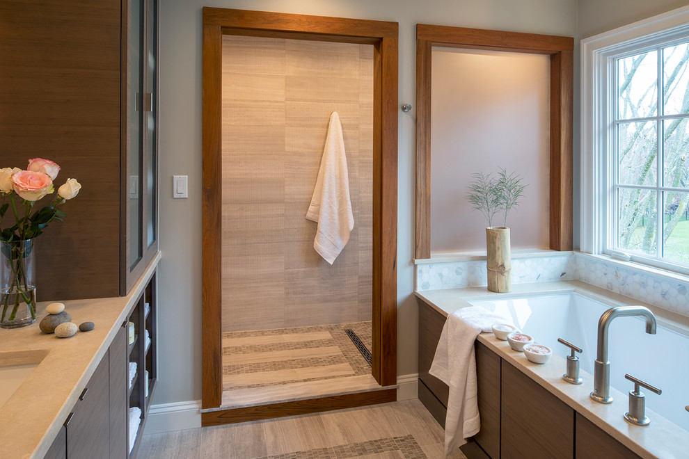 Design ideas for a mid-sized transitional master wet room bathroom in Baltimore with furniture-like cabinets, dark wood cabinets, an undermount tub, a one-piece toilet, beige tile, stone tile, grey walls, marble floors, an undermount sink, limestone benchtops, beige floor and an open shower.