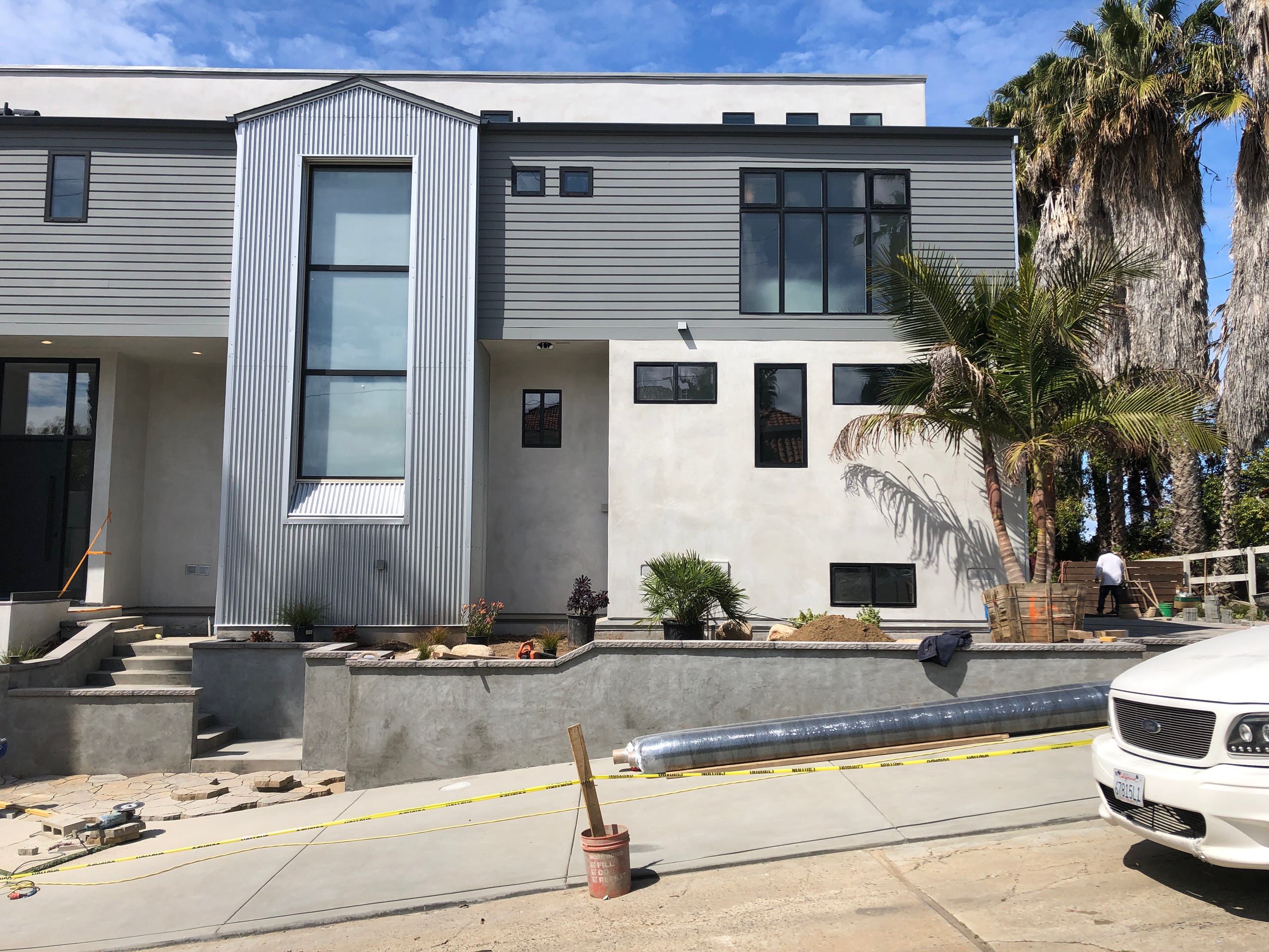 Installing Belgard Pavers Near Staircase in Del Mar