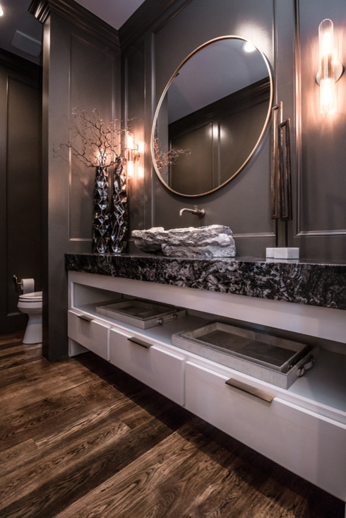 Inspiration for a large transitional powder room in Other with flat-panel cabinets, white cabinets, brown walls, medium hardwood floors, a vessel sink, granite benchtops, brown floor and multi-coloured benchtops.