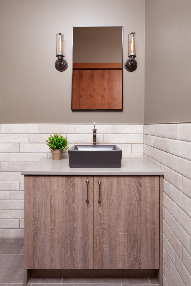 Bathroom - transitional ceramic tile, gray floor and single-sink bathroom idea with a vessel sink, quartz countertops, gray countertops and a built-in vanity