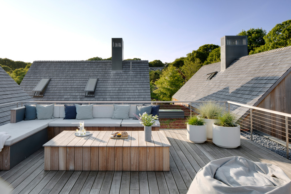 Large contemporary rooftop and rooftop deck in Boston with no cover.