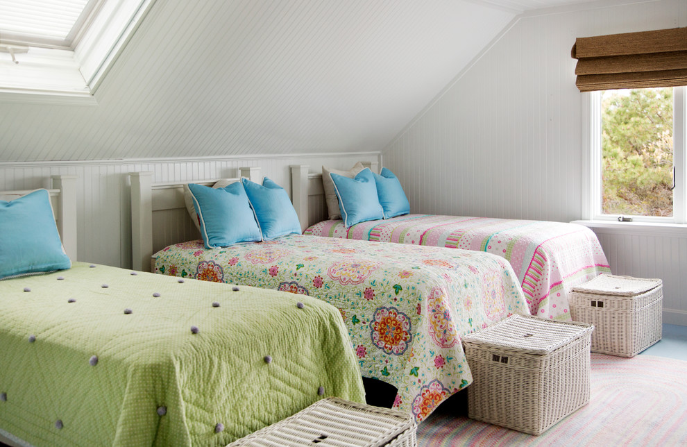 This is an example of a mid-sized beach style guest bedroom in Boston with white walls and no fireplace.