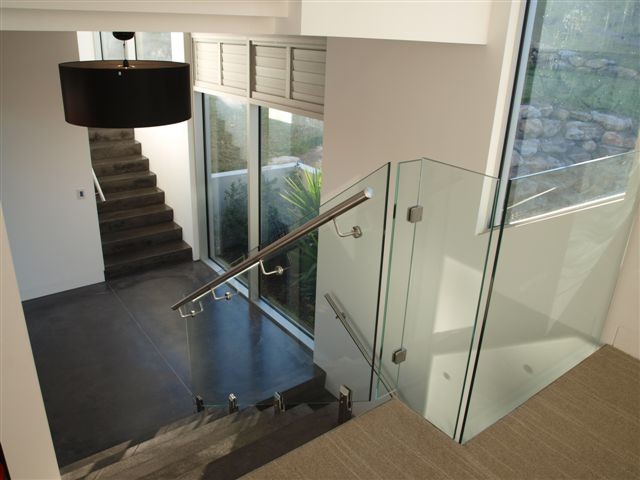This is an example of a medium sized contemporary staircase in Sydney.