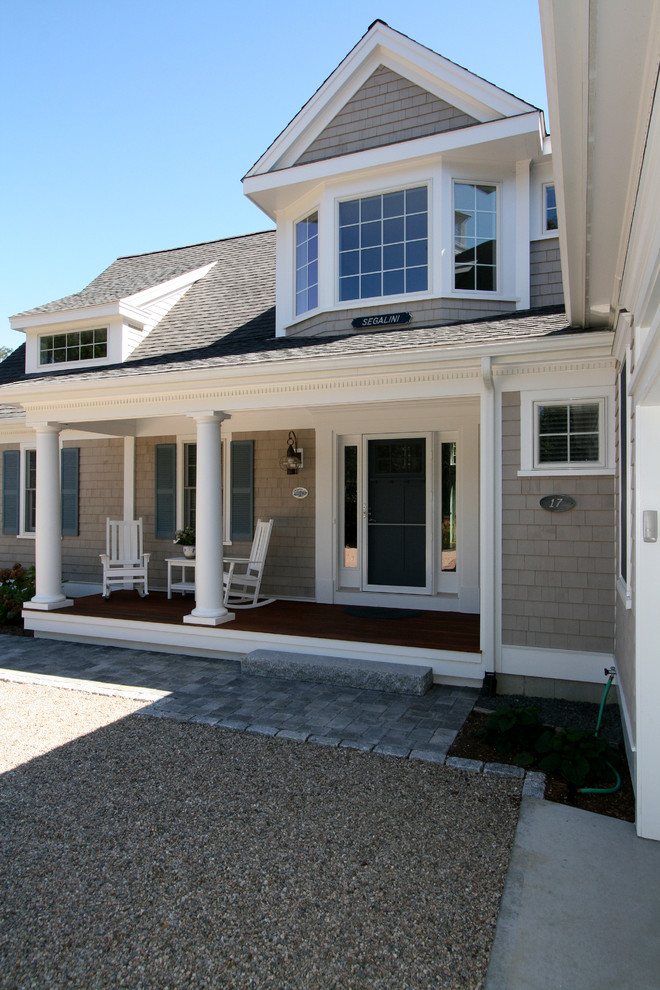 This is an example of a two-storey exterior in Boston with wood siding.
