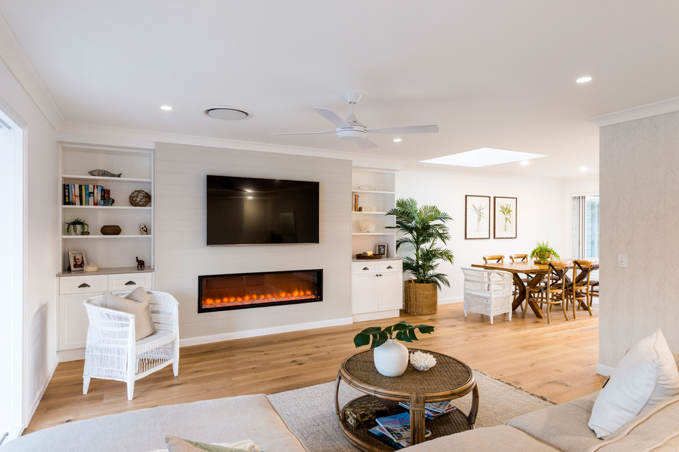 This is an example of a mid-sized beach style living room in Gold Coast - Tweed.