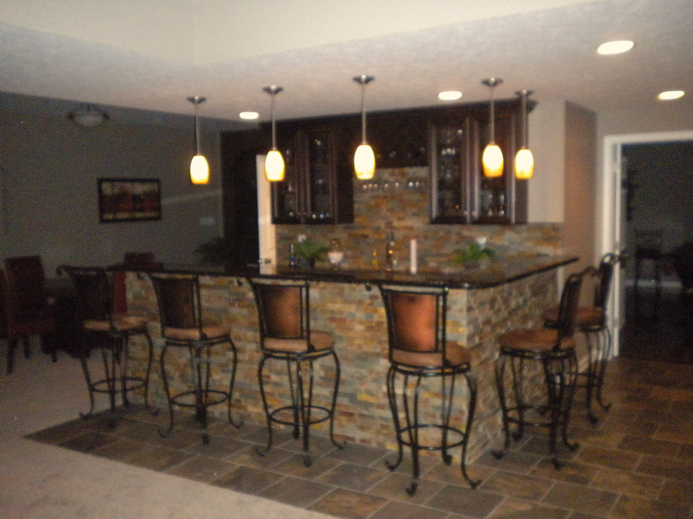 Design ideas for a transitional home bar in Indianapolis.