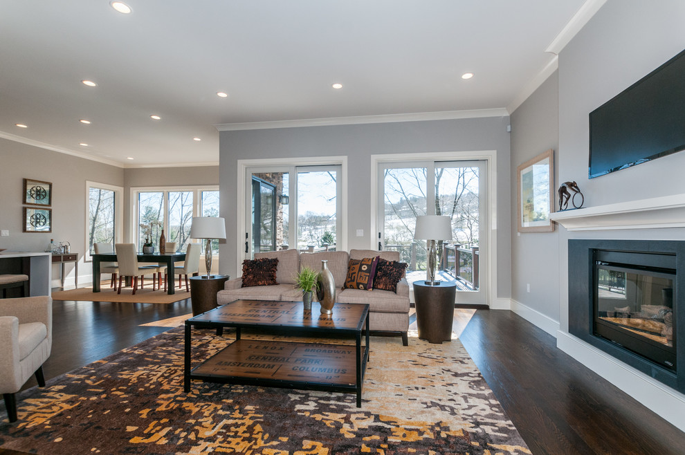Example of a transitional home design design in Boston
