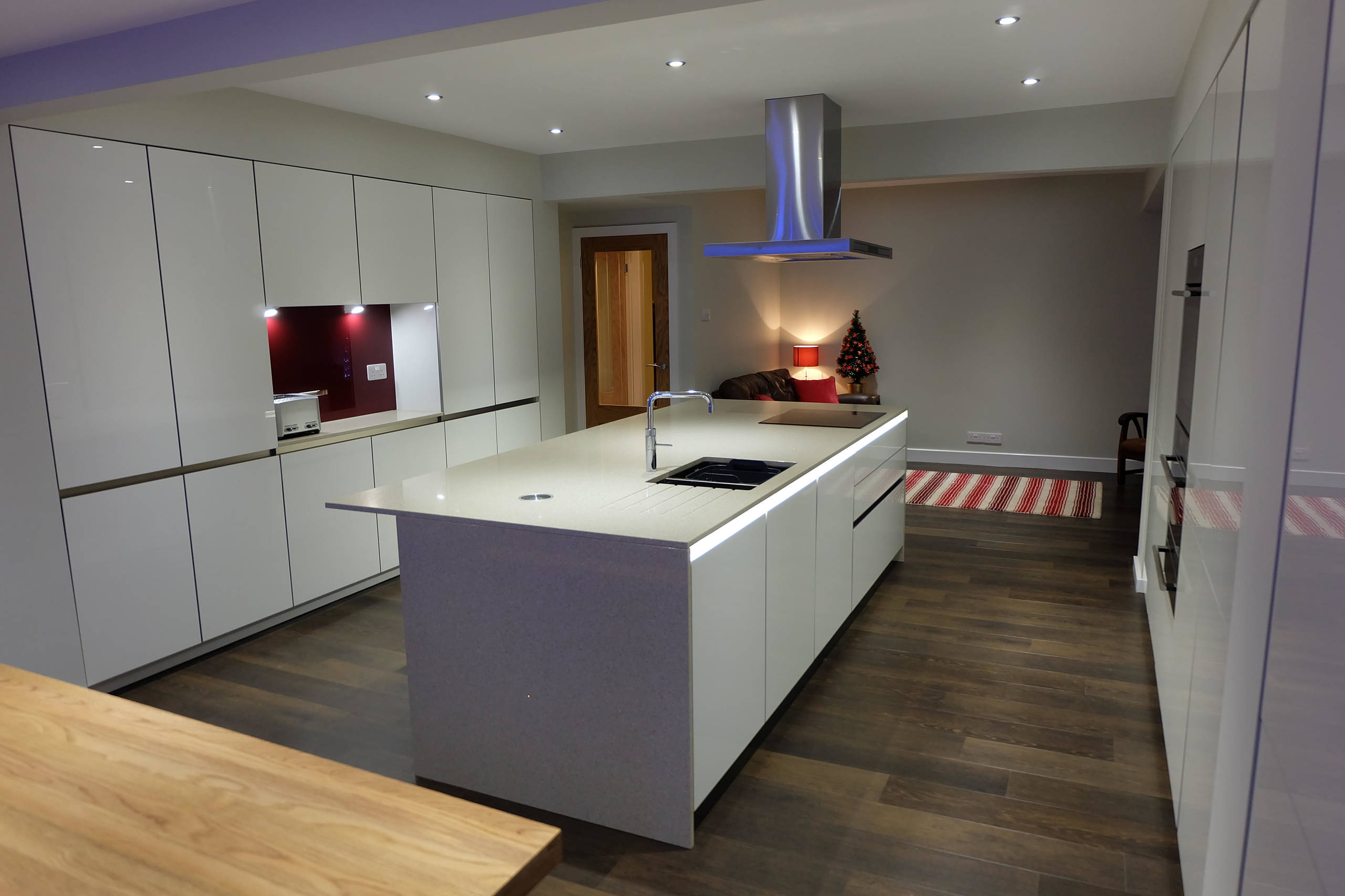 White Gloss Handleless Keller Kitchen with Brescia Stone Work Surfaces
