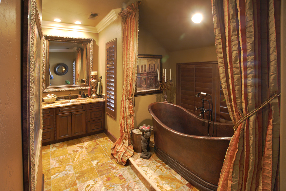 Design ideas for a traditional bathroom in Other with a freestanding tub.