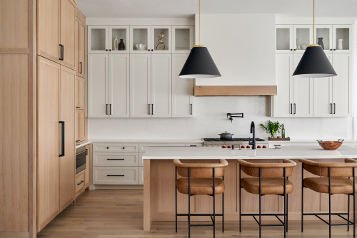 Organic modern kitchen with on trend cabinet hardware.