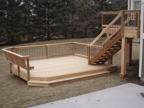 Design ideas for a large arts and crafts backyard deck in Minneapolis with no cover.