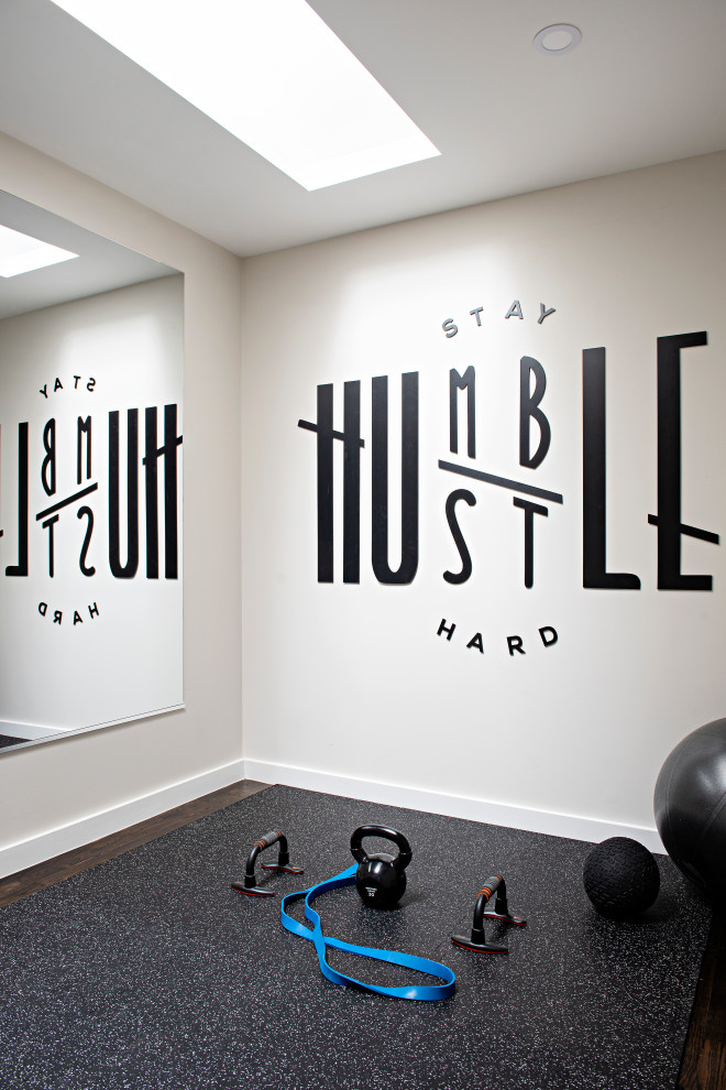 Inspiration for a mid-sized modern multipurpose gym in Toronto with white walls.