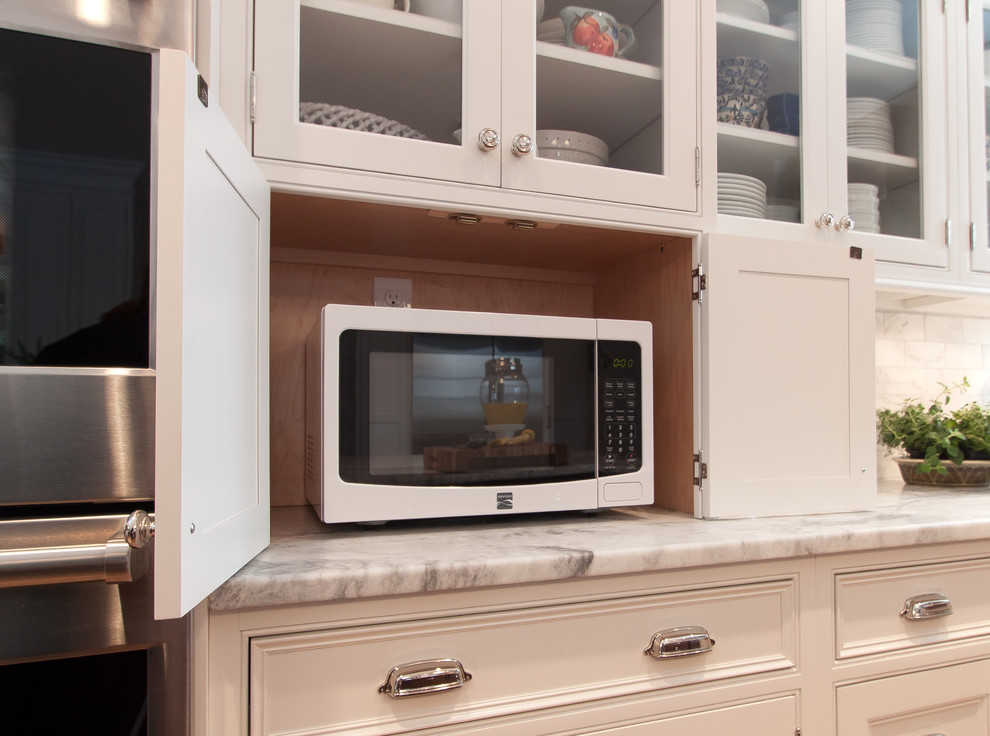 Large transitional kitchen photo in DC Metro with beaded inset cabinets, white cabinets, marble countertops, white backsplash, subway tile backsplash, stainless steel appliances and an island