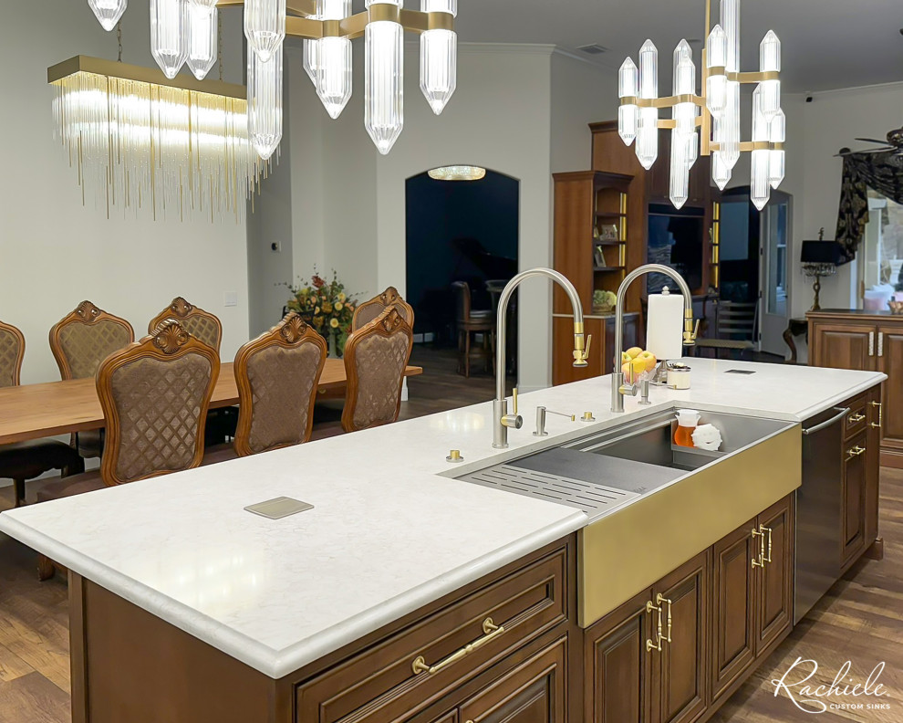 Trendy kitchen photo in Orlando with beaded inset cabinets, stainless steel appliances and an island