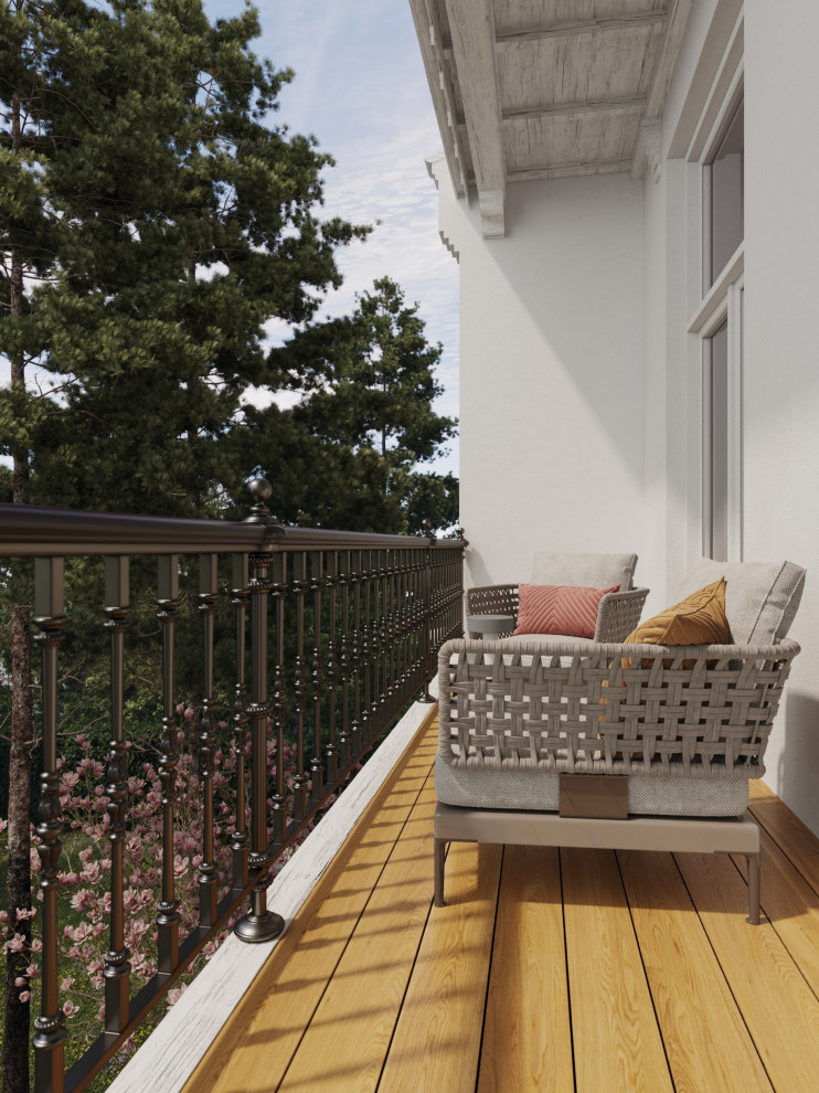 Small traditional balcony in Amsterdam with a roof extension and metal railing for for apartments.