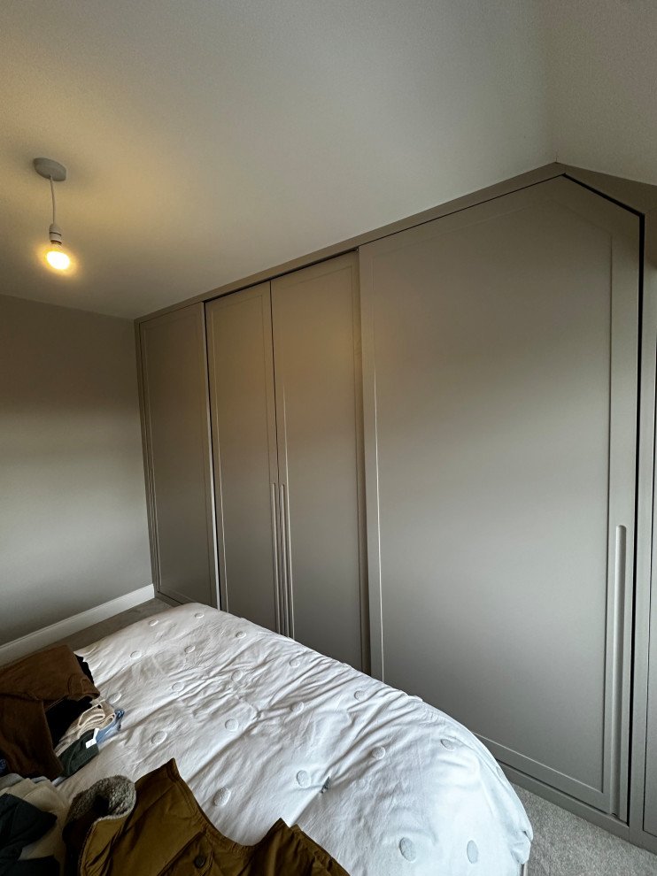 Sliding door wardrobe sprayed in farrow and ball elephants breath with oak int