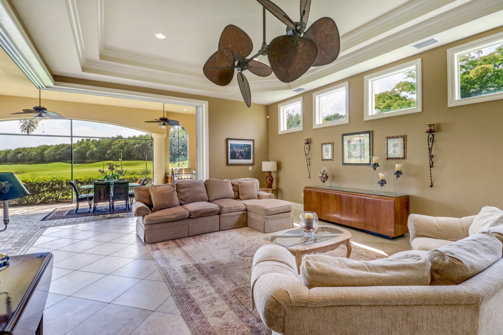 Inspiration for an expansive traditional open concept family room in Other with beige walls, ceramic floors, no fireplace, no tv, beige floor and recessed.