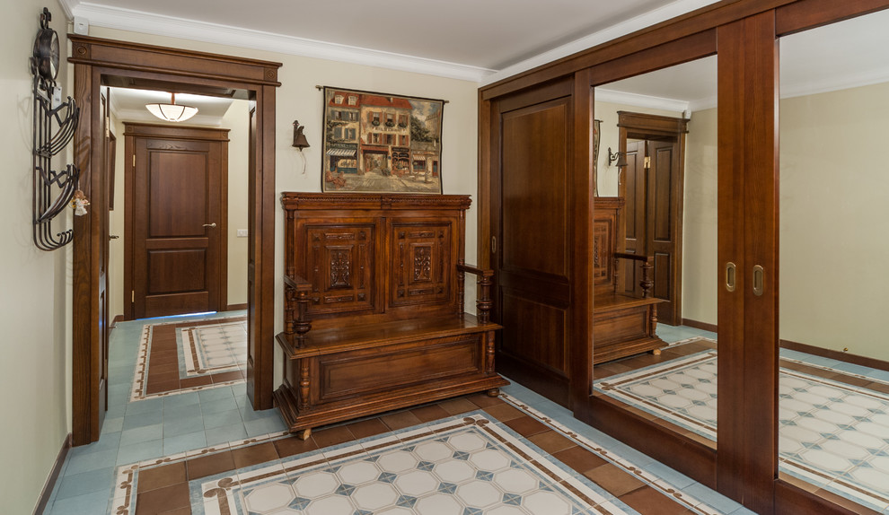 Traditional entryway in Moscow with beige walls.