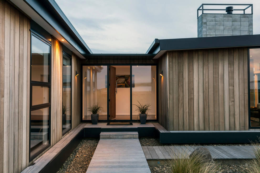 Photo of a mid-sized contemporary entryway in Christchurch.