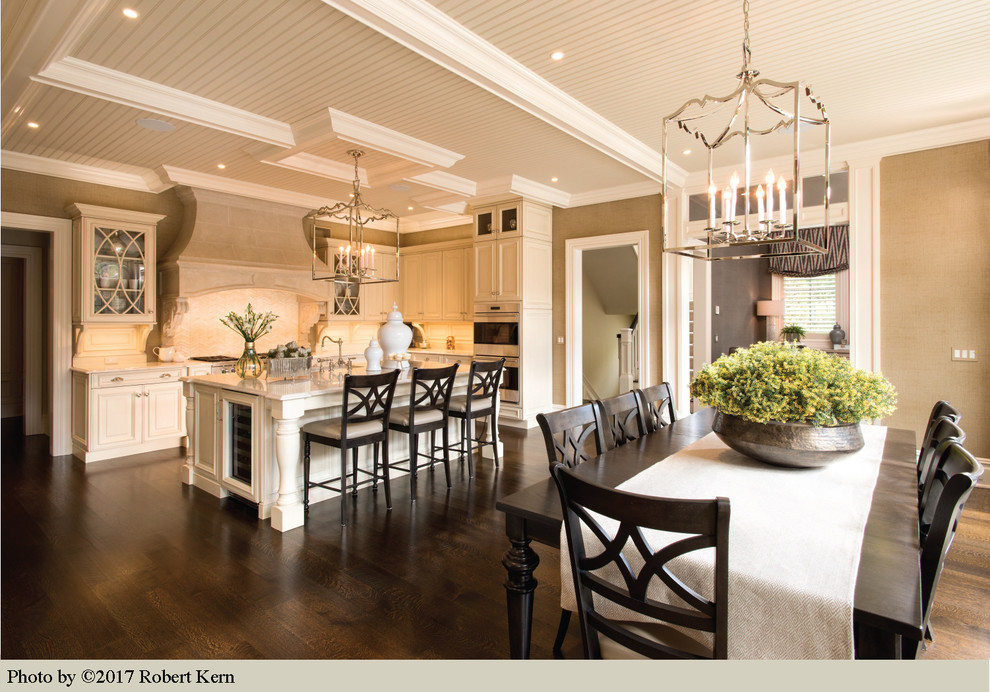Inspiration for a large transitional dark wood floor eat-in kitchen remodel in New York with a drop-in sink, glass-front cabinets, light wood cabinets, marble countertops, beige backsplash, wood backsplash, stainless steel appliances and an island
