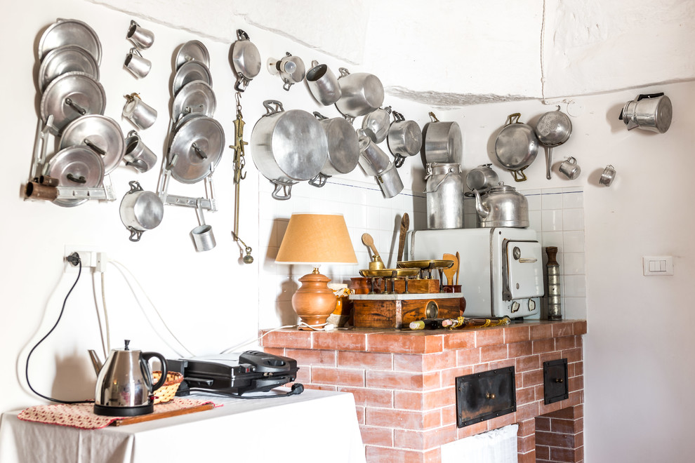 This is an example of a country kitchen in Barcelona.