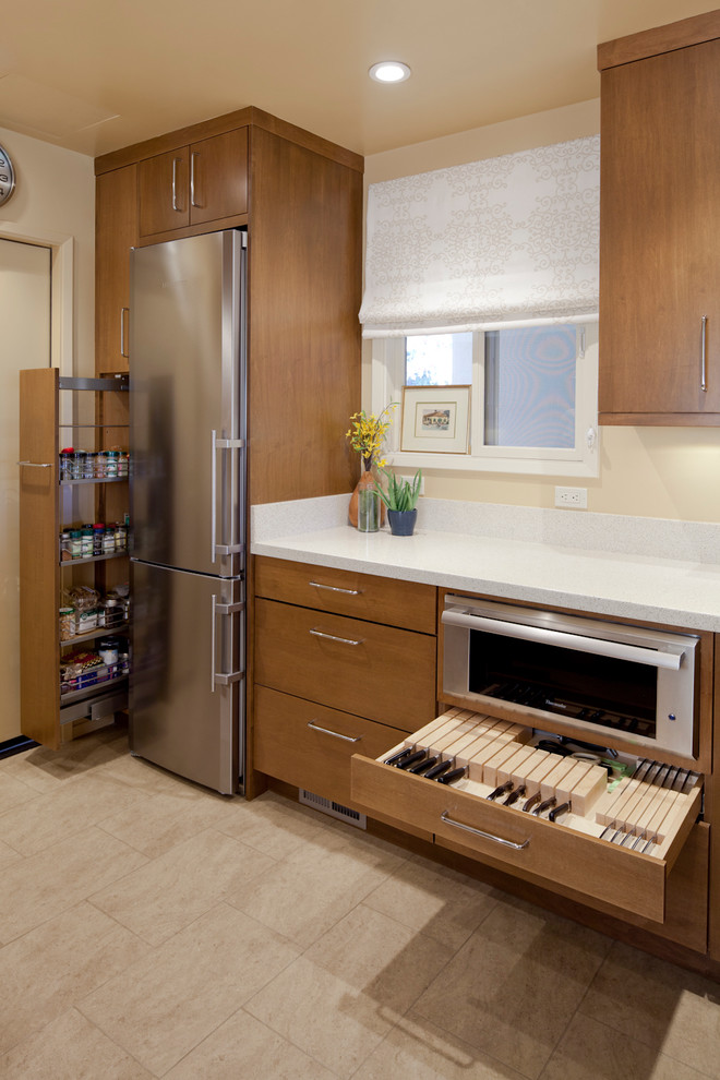 This is an example of a contemporary kitchen in San Francisco with stainless steel appliances.