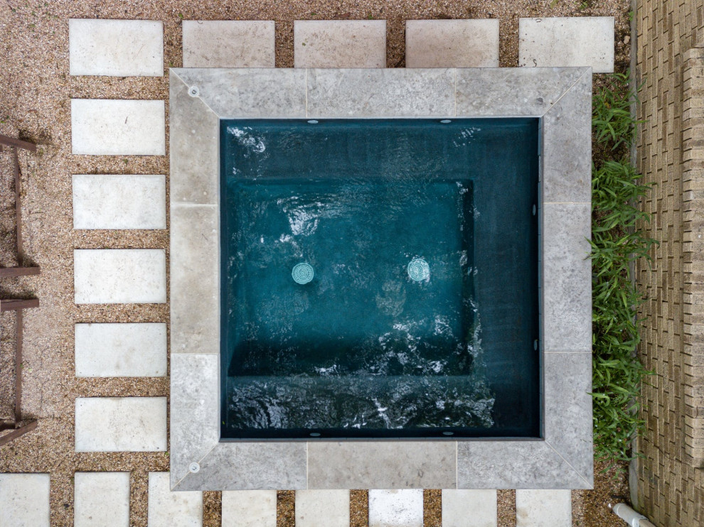 Inspiration for a small modern backyard pool in Austin.