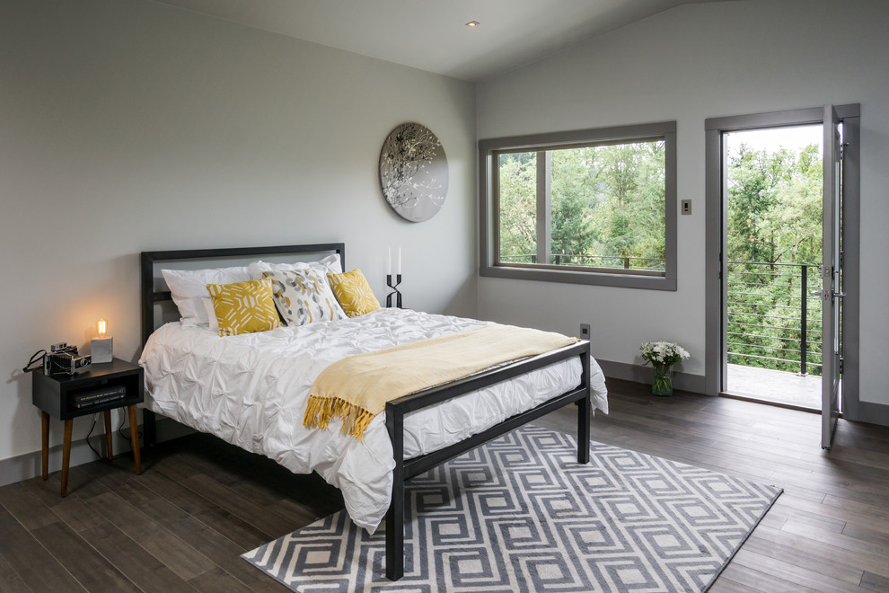 Design ideas for a large modern master bedroom in Other with grey walls and medium hardwood floors.
