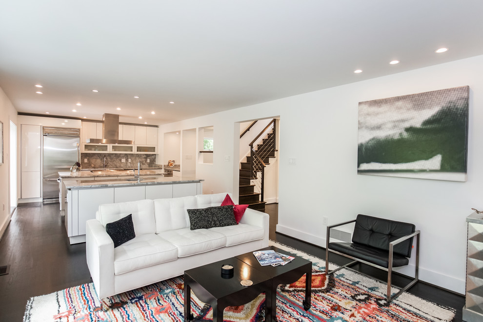 Living room - mid-sized contemporary open concept dark wood floor living room idea in DC Metro with white walls, a standard fireplace, a wall-mounted tv and a tile fireplace