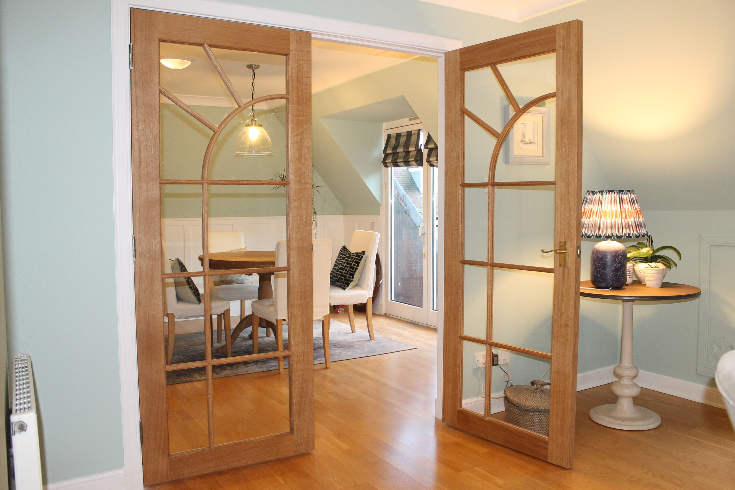 Internal doors with curved astragals