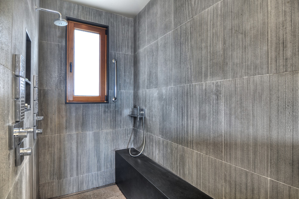 Contemporary bathroom in Orange County with gray tile.