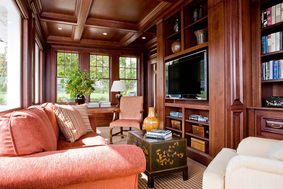 This is an example of a large traditional enclosed family room in Boston with brown walls, carpet and a built-in media wall.
