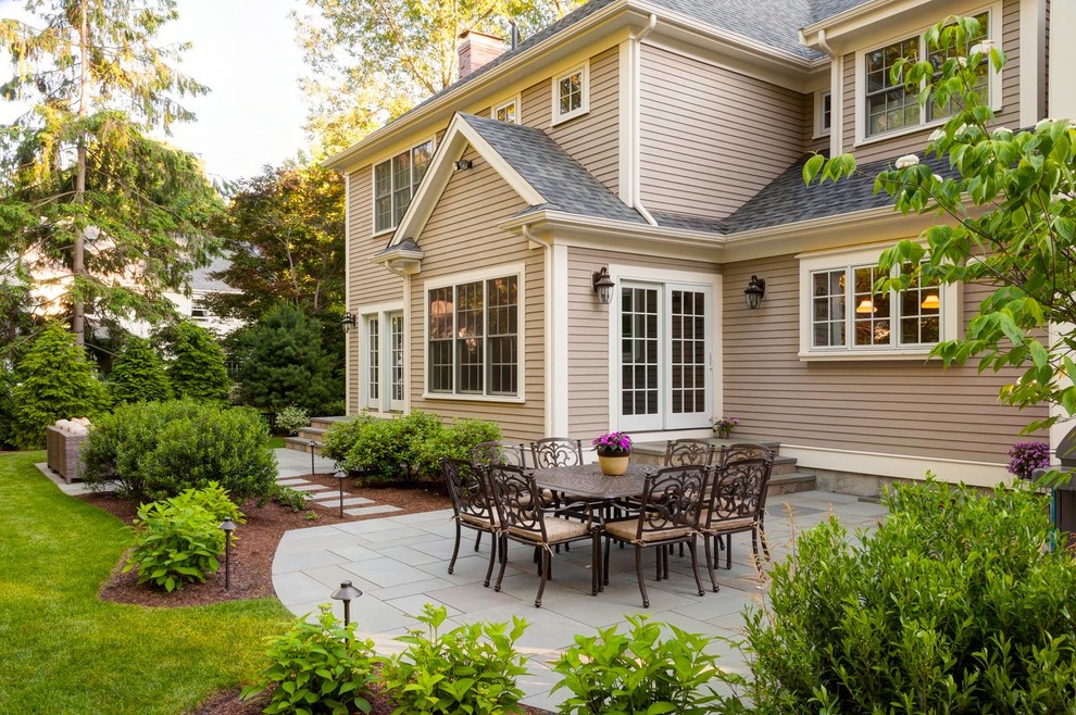 Elegant backyard patio photo in Boston with no cover