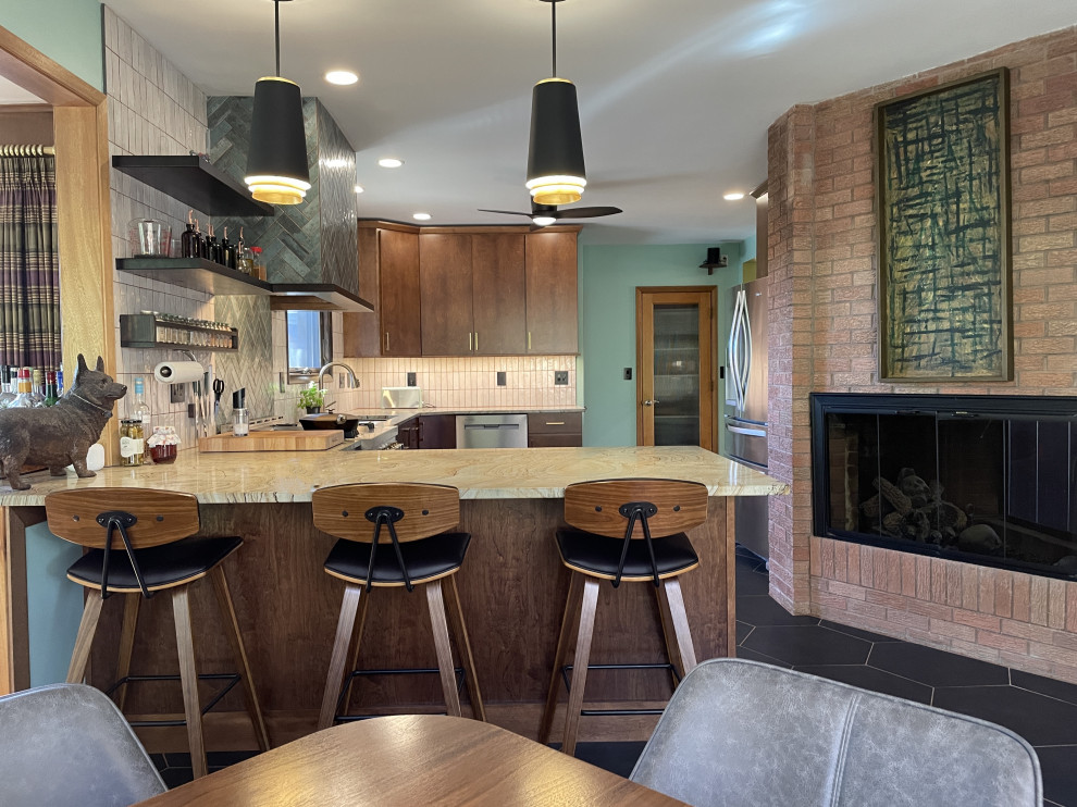This is an example of a mid-sized midcentury u-shaped eat-in kitchen in Other with an undermount sink, open cabinets, medium wood cabinets, quartzite benchtops, green splashback, porcelain splashback, stainless steel appliances, ceramic floors, a peninsula, black floor and green benchtop.