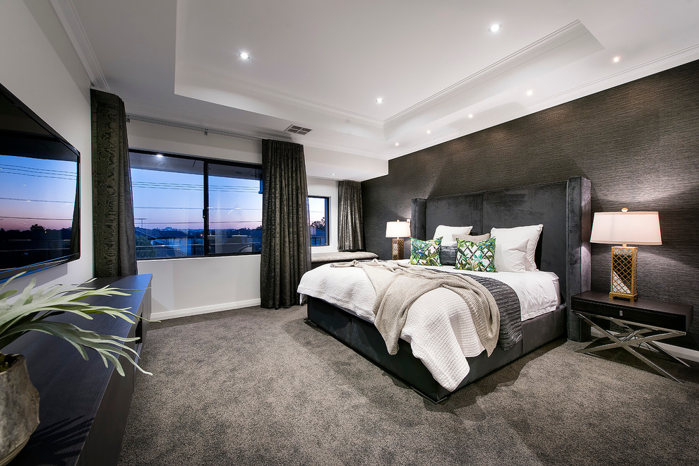 Large contemporary master bedroom in Perth with carpet, white walls and grey floor.