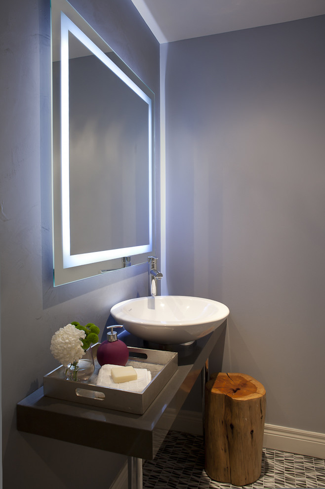 Design ideas for a contemporary powder room in Toronto with a vessel sink.