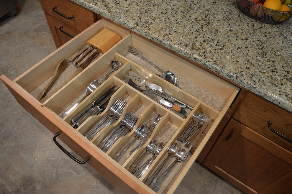 Mid-sized u-shaped kitchen photo with granite countertops