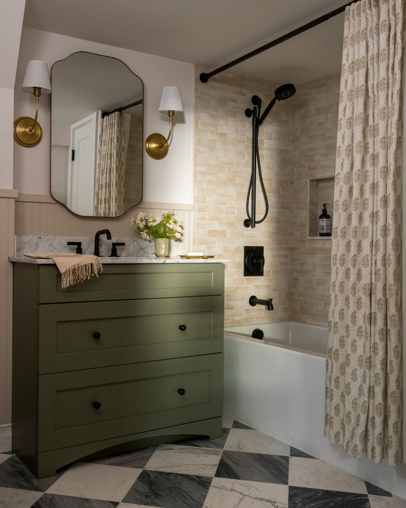 Example of a mid-sized transitional 3/4 beige tile and ceramic tile marble floor, multicolored floor, single-sink and wainscoting bathroom design in Seattle with shaker cabinets, green cabinets, a one-piece toilet, beige walls, an undermount sink, marble countertops, white countertops, a niche and a built-in vanity