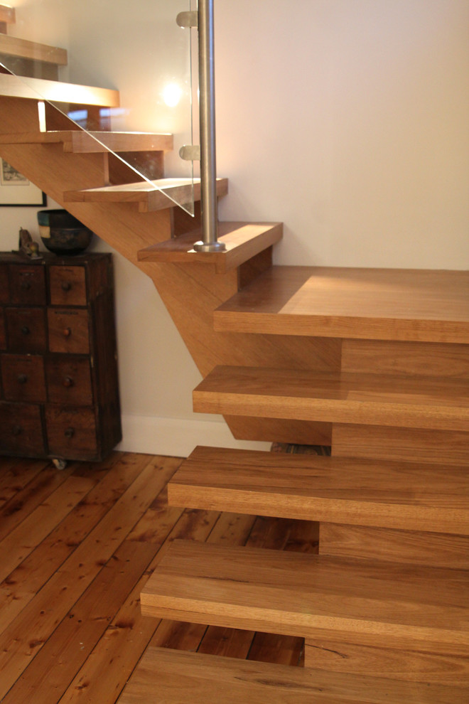 This is an example of a contemporary staircase in Other.