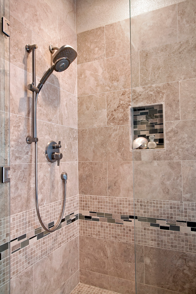Photo of a mid-sized traditional master bathroom in San Francisco with raised-panel cabinets, dark wood cabinets, a corner tub, a corner shower, a one-piece toilet, beige tile, mosaic tile, beige walls, an undermount sink, quartzite benchtops, beige floor and a hinged shower door.