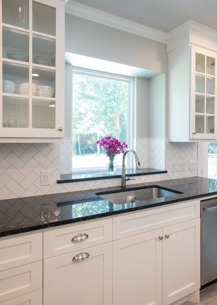 Example of a transitional kitchen design in Houston