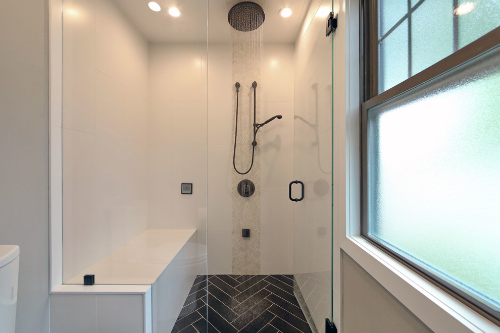 Mid-sized eclectic master bathroom in Boston with an undermount sink, distressed cabinets, an alcove shower, black tile, porcelain tile, beige walls and porcelain floors.