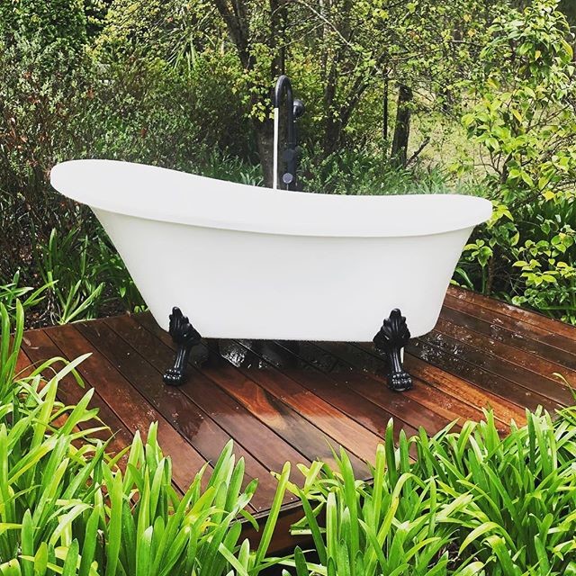 Country bathroom in Sydney with a freestanding tub.