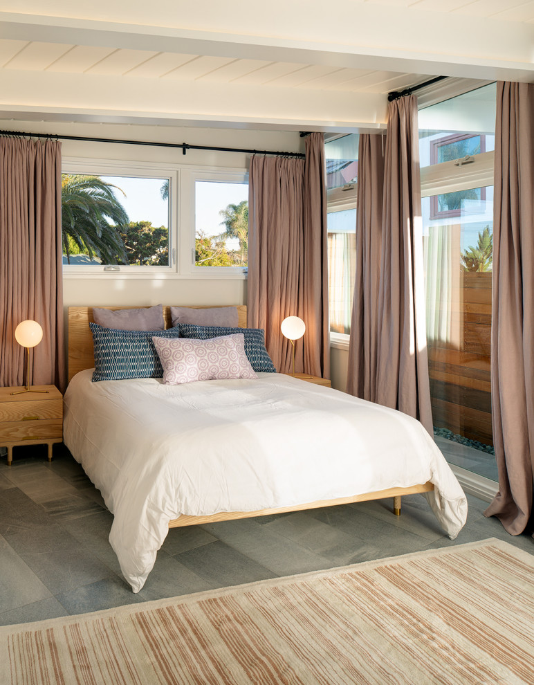 Photo of a beach style bedroom in San Diego.