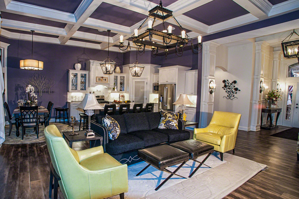Design ideas for a contemporary open concept living room in Cleveland with purple walls, dark hardwood floors, a standard fireplace, a wood fireplace surround and a wall-mounted tv.