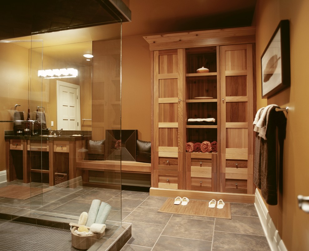 Design ideas for an expansive transitional master bathroom in Calgary with shaker cabinets, medium wood cabinets, brown walls and porcelain floors.