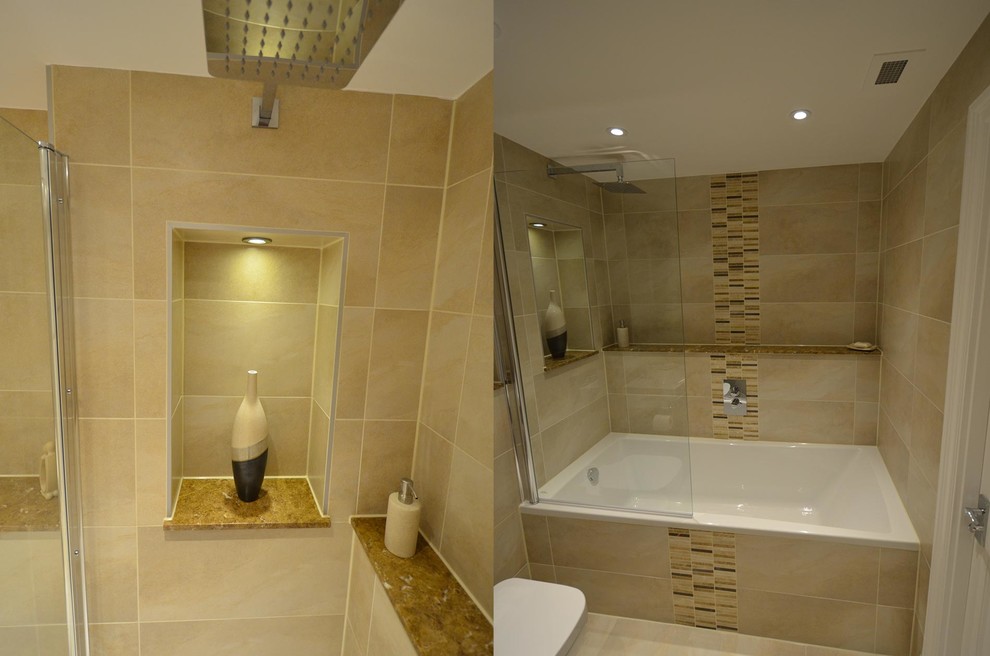 Contemporary kids bathroom in Surrey with a drop-in tub, a curbless shower, a wall-mount toilet, beige tile, ceramic tile, beige walls and marble benchtops.