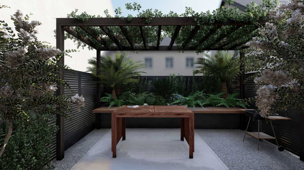 Cette photo montre une petite terrasse tendance avec une cour, des pavés en pierre naturelle et une pergola.