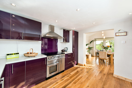 ultra violet cabinets and honey flooring