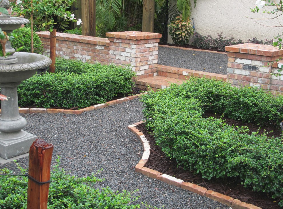 Courtyard garden brick walls and path - Traditional - Landscape - Miami